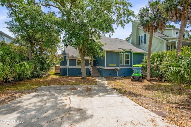 26 Fairway Club Dr, Fripp Island, SC 29920 - bungalow-style house with roof with shingles