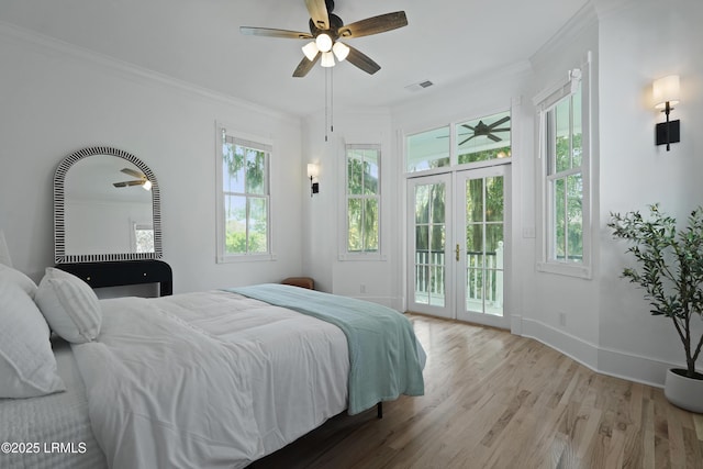 12 Sheffield Ct, Beaufort, SC 29907 - bedroom with access to exterior, french doors, wood finished floors, crown molding, and baseboards