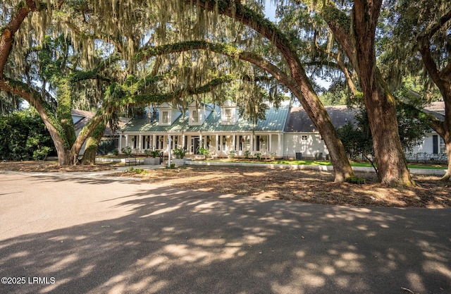 12 Sheffield Ct, Beaufort, SC 29907 - new england style home with a porch and metal roof