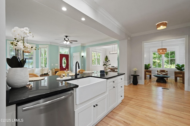 12 Sheffield Ct, Beaufort, SC 29907 - kitchen featuring dishwasher, a sink, dark countertops, crown molding, and light wood finished floors
