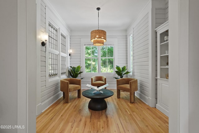 12 Sheffield Ct, Beaufort, SC 29907 - living area featuring light wood-style floors, crown molding, and baseboards