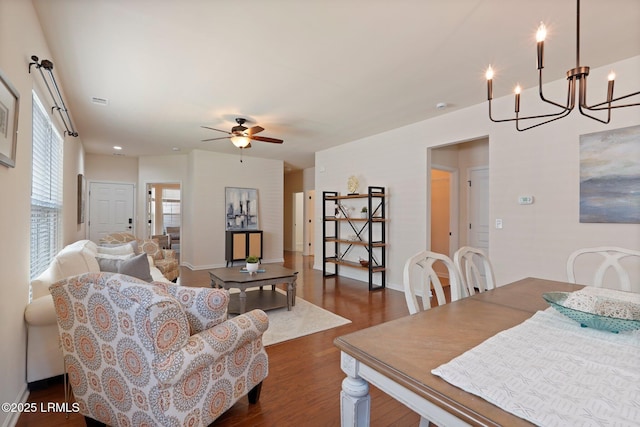95 Sunrise Point Dr, Okatie, SC 29909 - living room with dark wood-type flooring, a chandelier, a ceiling fan, and baseboards