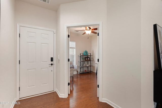 95 Sunrise Point Dr, Okatie, SC 29909 - entrance foyer featuring dark wood-type flooring, ceiling fan, and baseboards