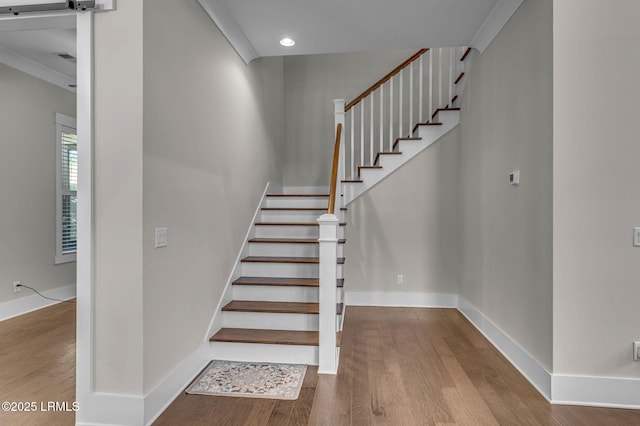 39 Sweet Marsh Ct, Bluffton, SC 29910 - stairway featuring wood finished floors, recessed lighting, and crown molding