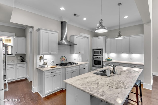 39 Sweet Marsh Ct, Bluffton, SC 29910 - kitchen featuring appliances with stainless steel finishes, wall chimney range hood, backsplash, white cabinetry, and recessed lighting
