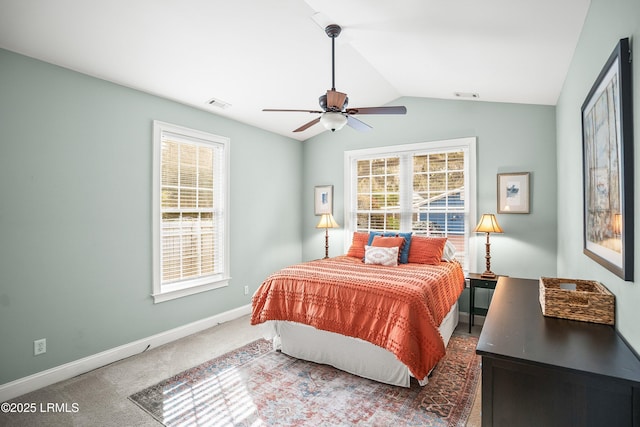 bedroom with lofted ceiling, carpet, visible vents, and baseboards