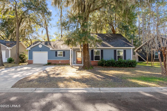 single story home with a garage