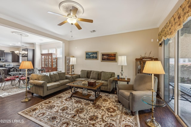 303 Hampton Lake Xing, Bluffton, SC 29910 - living room featuring a chandelier, wood finished floors, a ceiling fan, and ornamental molding