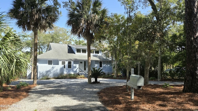 view of front of home featuring gravel driveway