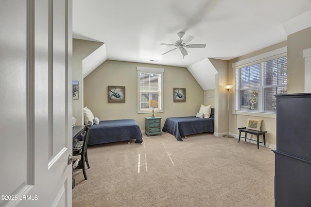 carpeted bedroom with ceiling fan and lofted ceiling