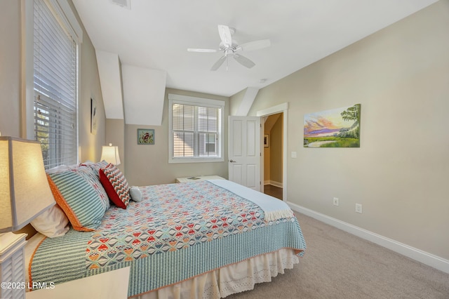 bedroom with ceiling fan and carpet flooring