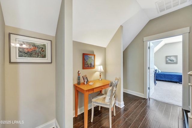 office featuring dark hardwood / wood-style floors and vaulted ceiling