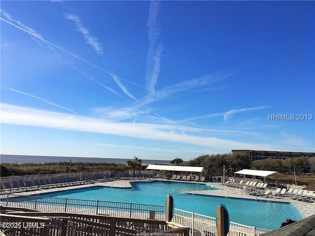 view of swimming pool with a patio area