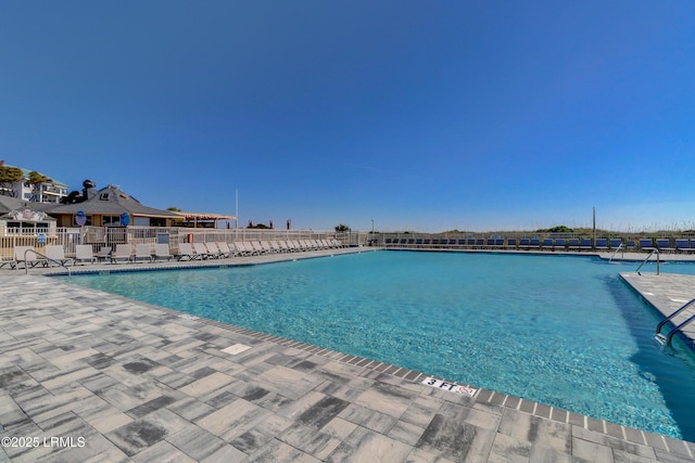 view of pool featuring a patio