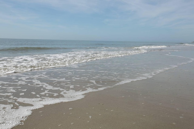 view of water feature featuring a beach view