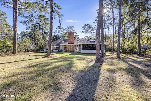 view of front of home with a front yard