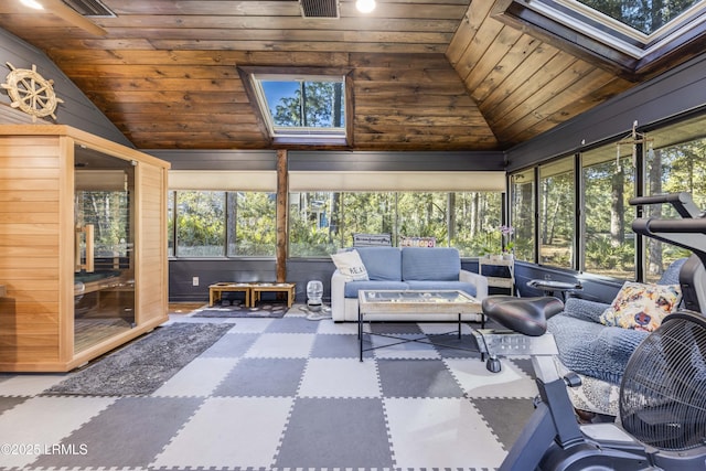 sunroom with lofted ceiling with skylight and wood ceiling