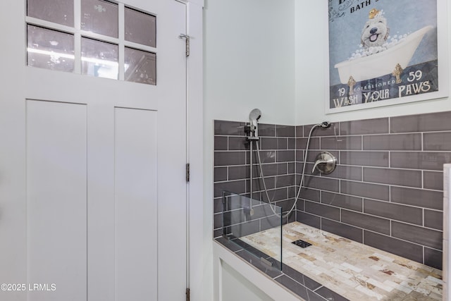 bathroom featuring a shower