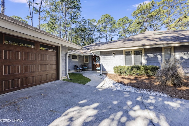 exterior space with a garage