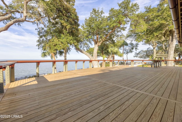 wooden terrace with a water view