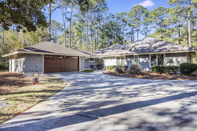 ranch-style home with a garage