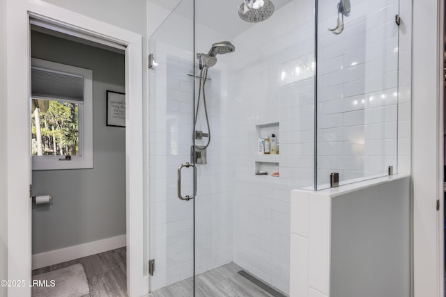 bathroom featuring an enclosed shower