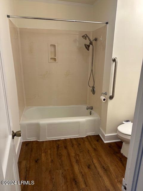 bathroom featuring toilet and hardwood / wood-style floors