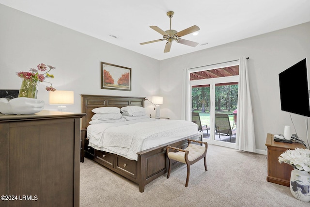 carpeted bedroom with access to exterior and ceiling fan