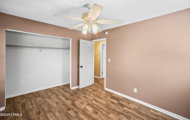 4392 Pinewood Cir, Beaufort, SC 29906 - unfurnished bedroom with ceiling fan, a closet, baseboards, and wood finished floors