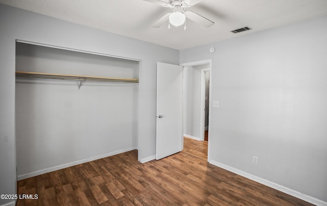 4392 Pinewood Cir, Beaufort, SC 29906 - unfurnished bedroom featuring visible vents, a closet, baseboards, and wood finished floors