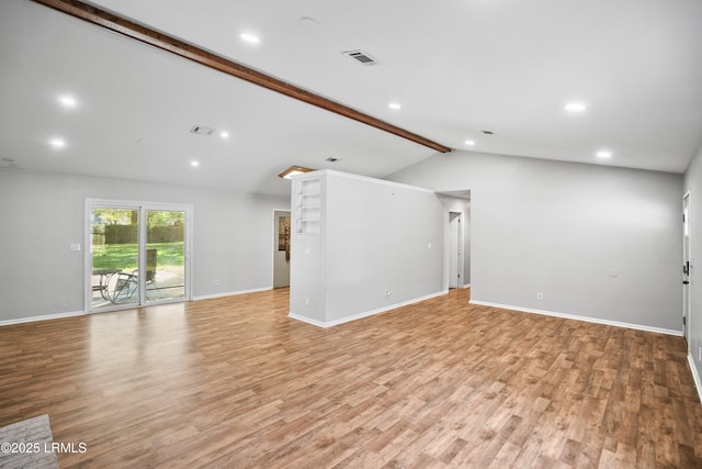 4392 Pinewood Cir, Beaufort, SC 29906 - unfurnished living room featuring visible vents, baseboards, lofted ceiling with beams, light wood-style floors, and recessed lighting