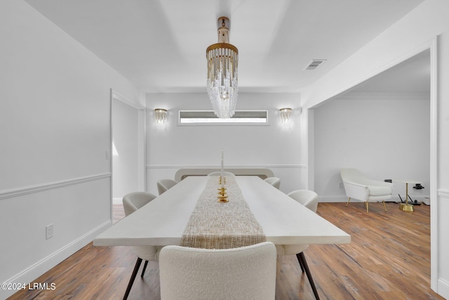 dining room with hardwood / wood-style floors