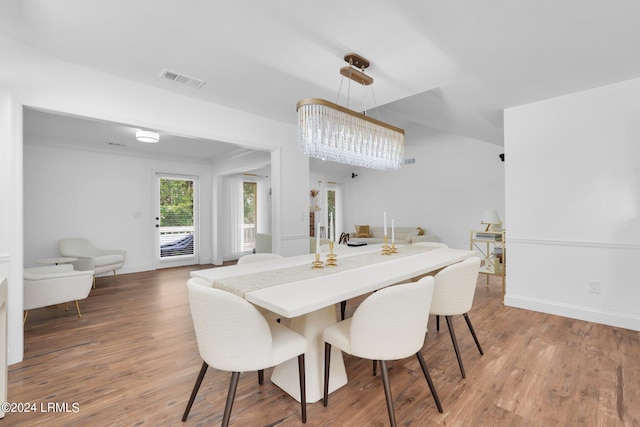 dining area featuring hardwood / wood-style floors