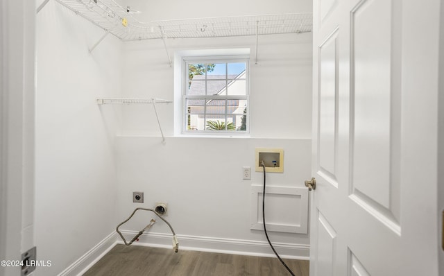 clothes washing area featuring washer hookup, wood-type flooring, and electric dryer hookup
