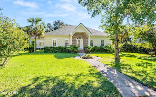 view of front of property with a front lawn