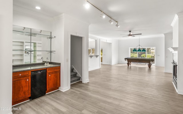 bar featuring sink, crown molding, light hardwood / wood-style flooring, and billiards