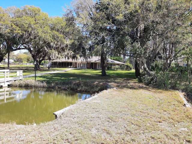 view of yard with a water view