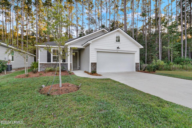 view of front of house with a garage, stone siding, driveway, and a front lawn