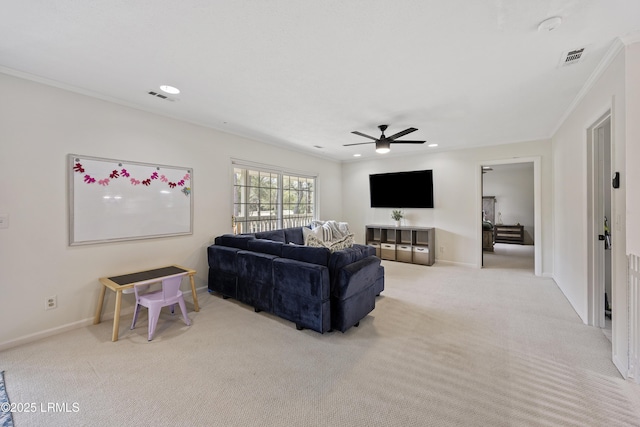 living room featuring light carpet, recessed lighting, visible vents, and ornamental molding