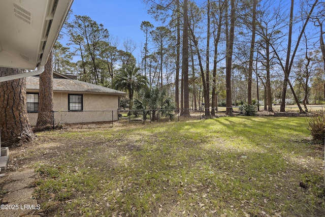 view of yard with fence