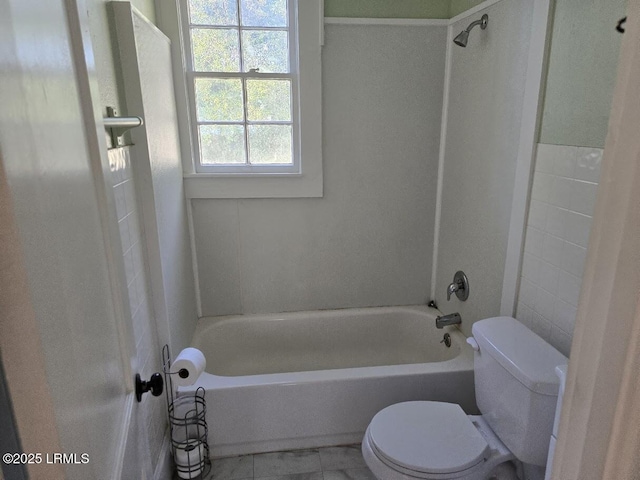 bathroom featuring  shower combination and toilet