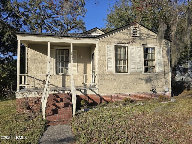 bungalow-style house featuring covered porch