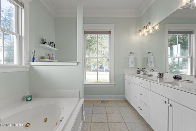 bathroom with ornamental molding, vanity, a bathtub, and a wealth of natural light