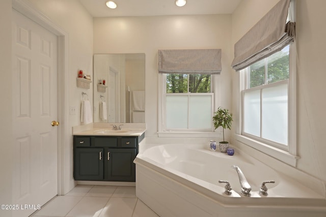 19 Brisbane Dr, Beaufort, SC 29902 - full bathroom featuring a garden tub, vanity, tile patterned flooring, and recessed lighting