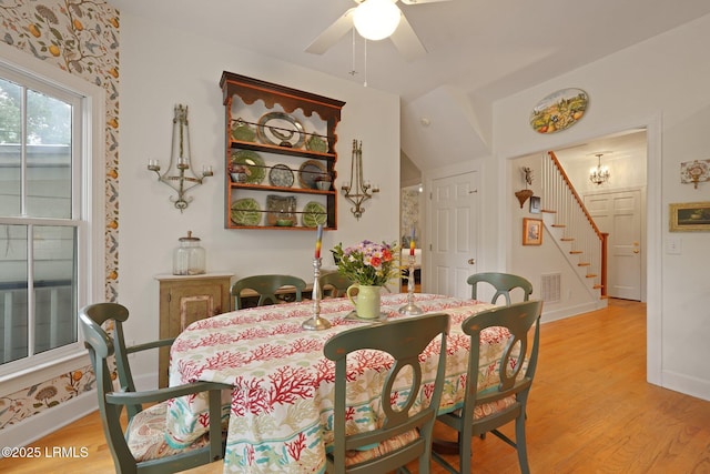 19 Brisbane Dr, Beaufort, SC 29902 - dining space with ceiling fan, light wood-type flooring, visible vents, stairway, and baseboards