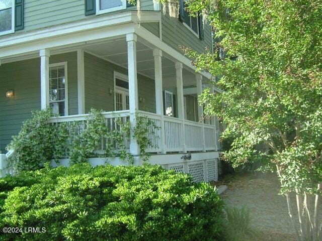 view of home's exterior featuring a porch