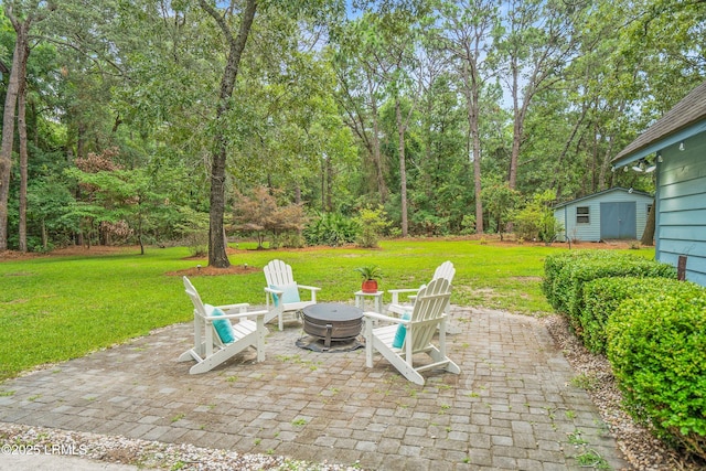21 Planters Cir, Beaufort, SC 29907 - view of patio featuring an outdoor fire pit and a shed