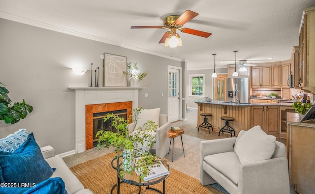 21 Planters Cir, Beaufort, SC 29907 - living room with a ceiling fan, ornamental molding, and a tile fireplace