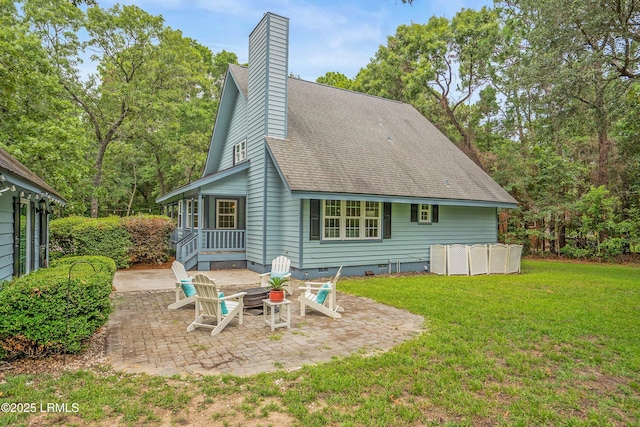 21 Planters Cir, Beaufort, SC 29907 - rear view of house featuring a lawn, a patio area, crawl space, a chimney, and a shingled roof