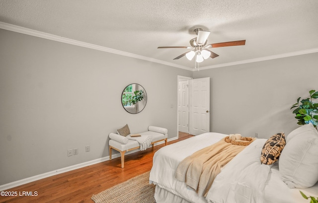 21 Planters Cir, Beaufort, SC 29907 - bedroom featuring wood finished floors, crown molding, a textured ceiling, and ceiling fan